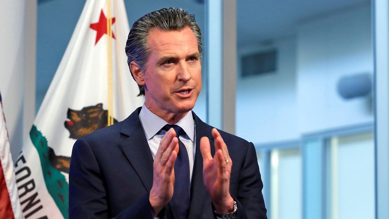 In this April 14, 2020, file photo, California Gov. Gavin Newsom discusses an outline for what it will take to lift coronavirus restrictions during a news conference at the Governor's Office of Emergency Services in Rancho Cordova. While California will end most coronavirus rules on June 15, Newsom said Friday he would not lift the "state of emergency" that has been in place since March 2020. (AP Photo/Rich Pedroncelli, Pool, File)
