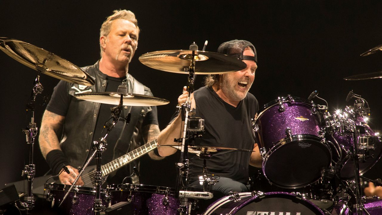 James Hetfield, left, and Lars Ulrich of the band Metallica perform in concert during their "WorldWired Tour" at The Wells Fargo Center on Thursday, Oct. 25, 2018, in Philadelphia. (Photo by Owen Sweeney/Invision/AP)