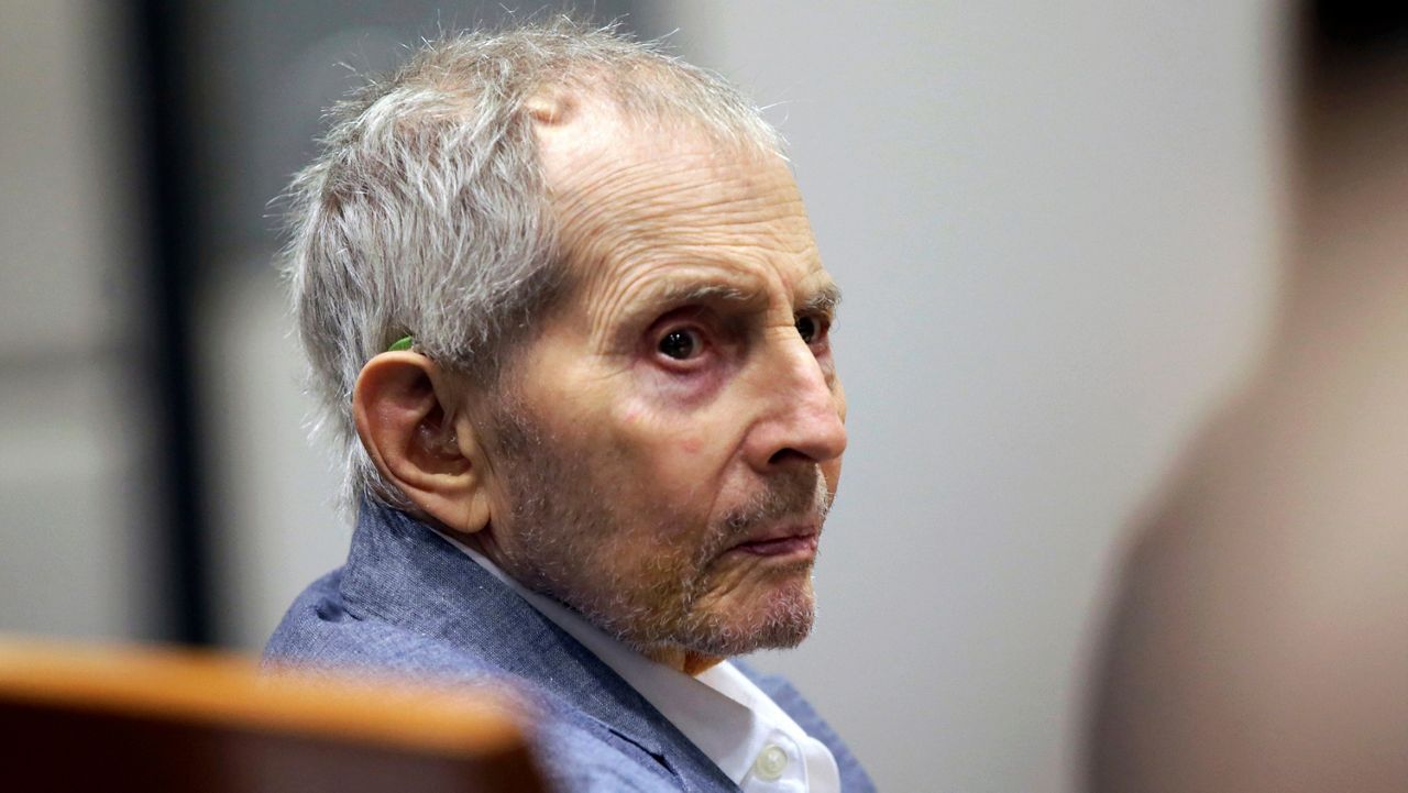 In this March 10, 2020, file photo, real estate heir Robert Durst looks over during his murder trial in Los Angeles. The murder trial of the eccentric New York real estate heir Durst will resume May 17, 2021, after more than a yearlong hiatus due to the coronavirus pandemic, a judge said Monday. (AP Photo/Alex Gallardo, Pool, File)