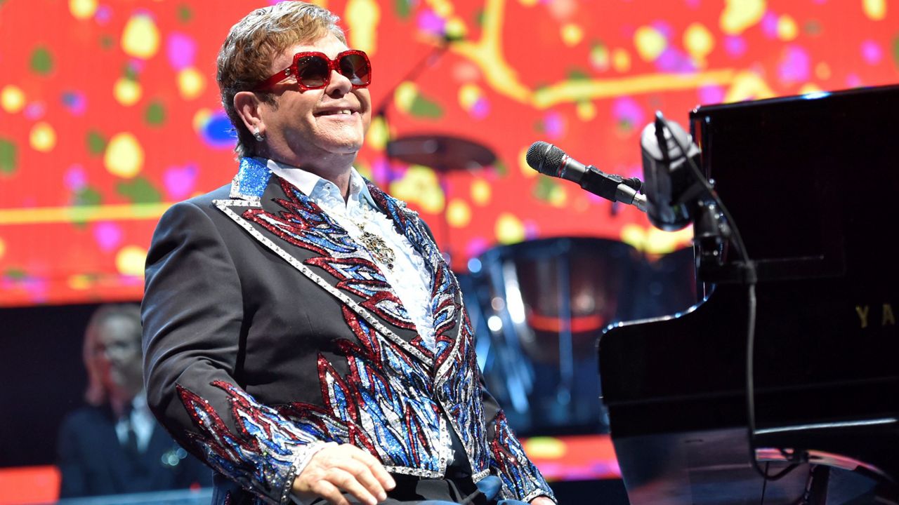 In this Feb. 15, 2019, file photo, Elton John performs during his Elton John Farewell Yellow Brick Road tour in Rosemont, Ill. (Photo by Rob Grabowski/Invision/AP)