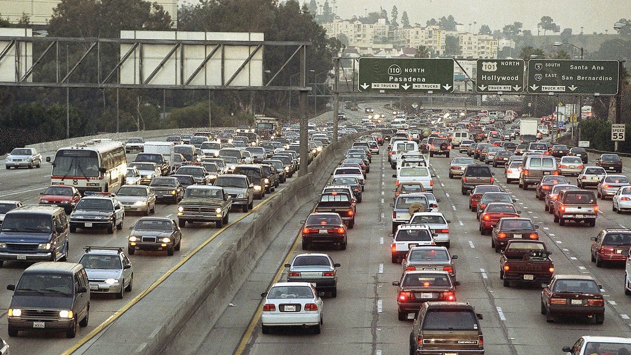 In this Nov. 25, 1998, file photo, traffic moves at a crawl in all directions of the Harbor Freeway in downtown Los Angeles. (AP Photo/Reed Saxon)