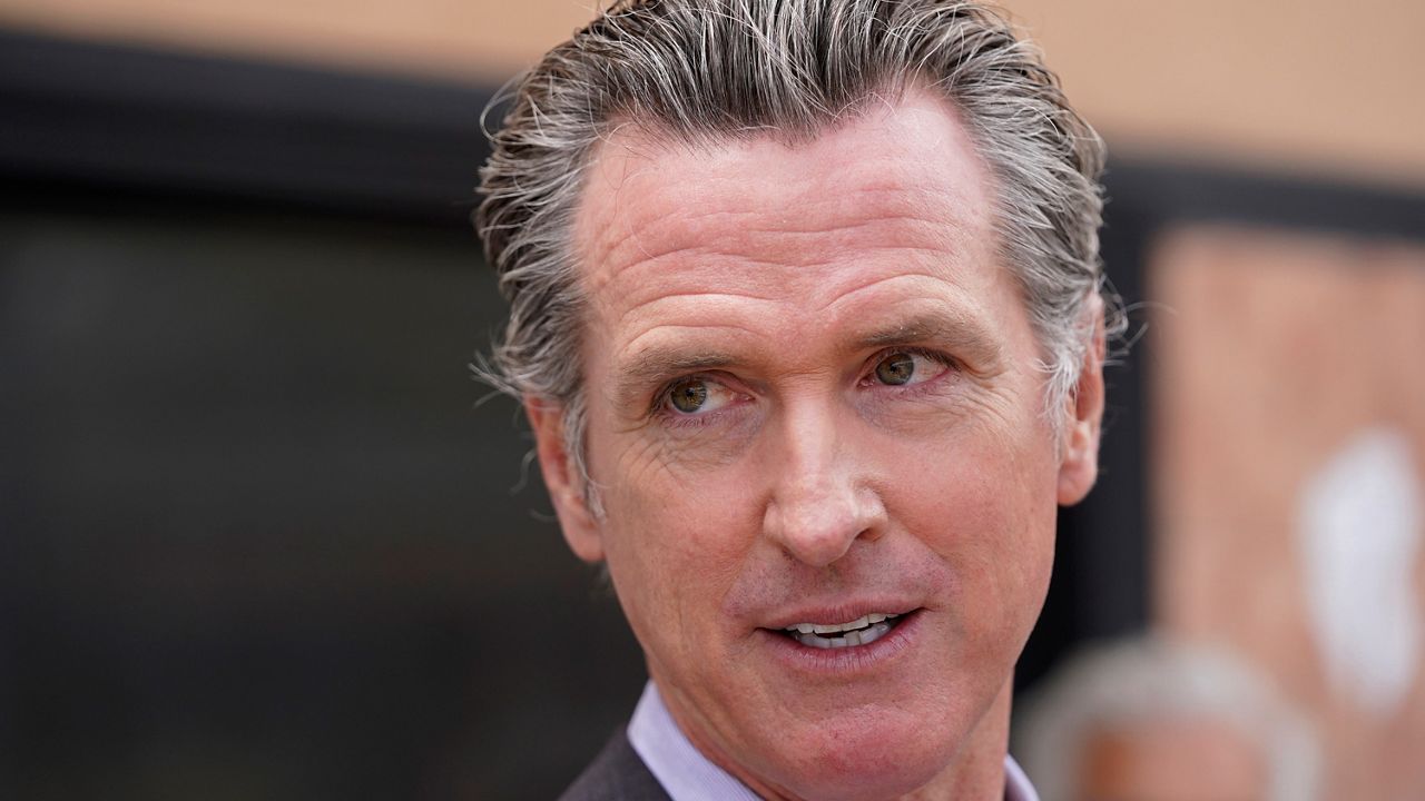 In this June 3, 2021, file photo, California Gov. Gavin Newsom listens to questions during a news conference in San Francisco. Democrats in the state Legislature are trying to alter the state's recall laws in a move that would allow Newsom's election to be held earlier. (AP Photo/Eric Risberg, File