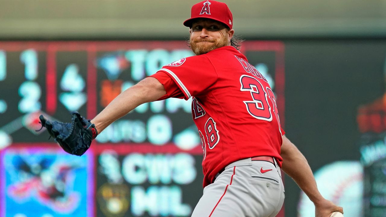 Los Angeles Angels pitcher Alex Cobb winds up duirng the first inning of the team's baseball game against the Minnesota Twins, Friday, July 23, 2021, in Minneapolis. (AP Photo/Jim Mone)