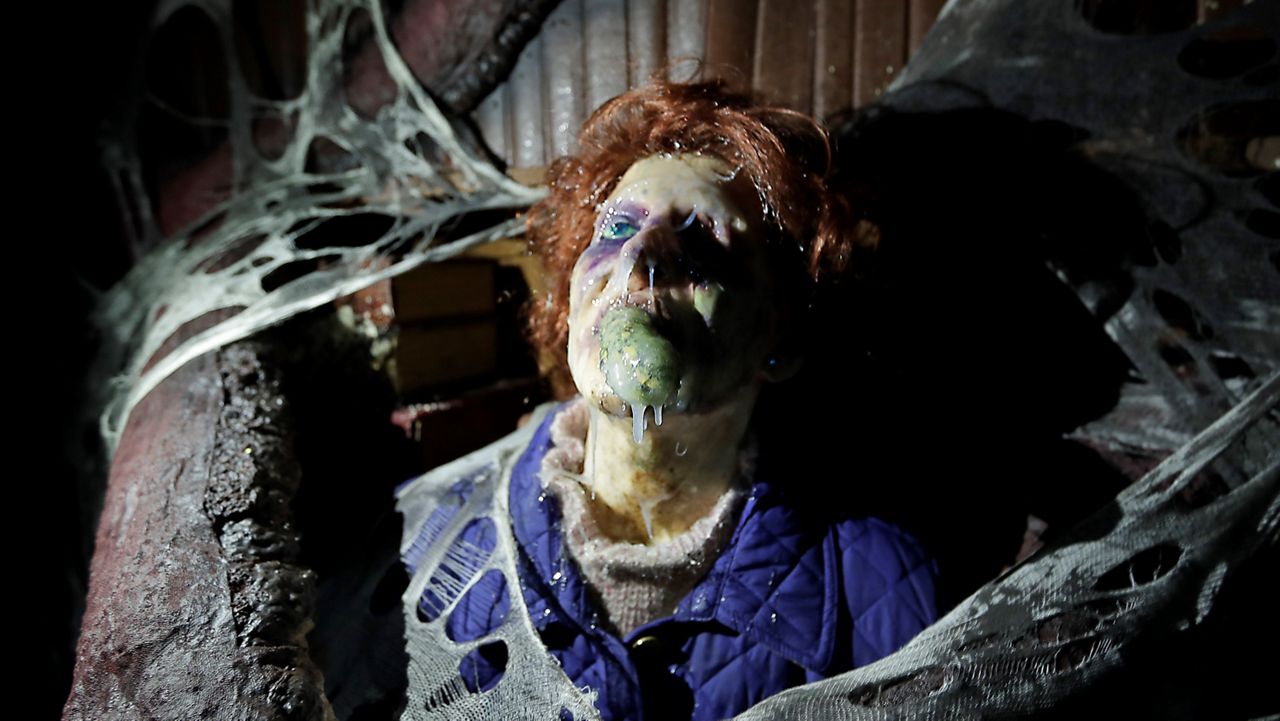 In this Sept. 12, 2018, file photo, the character Barb appears in grand, gory style in the Stranger Things haunted house during Halloween Horror nights at Universal Studios in Orlando, Fla. (AP Photo/John Raoux)