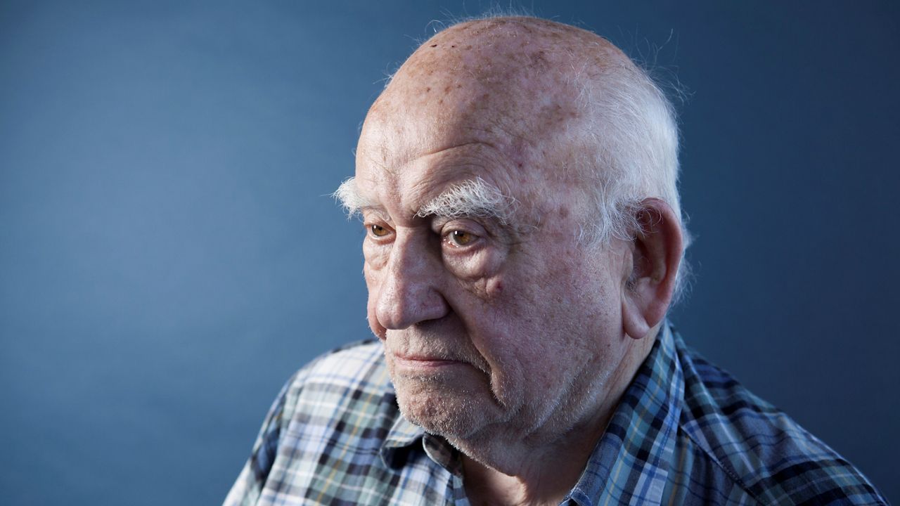 This Oct. 8, 2018 photo shows Ed Asner posing for a portrait at Golden Apple Comics in Los Angeles to promote an internet comic-art auction to raise funds for The Ed Asner Family Center. (Photo by Rebecca Cabage/Invision/AP)