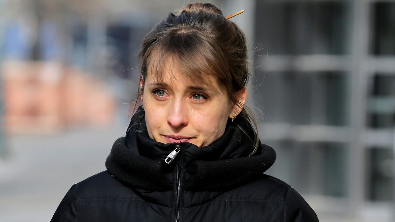In this Jan. 28, 2019, file photo, Allison Mack leaves Brooklyn federal court in New York. Mack was sentenced in a case involving NXIVM, a self-help group charged with coercing women to be a part of a secret sub-group where they were expected to act as "slaves" and engage in sex acts. (AP Photo/Seth Wenig)