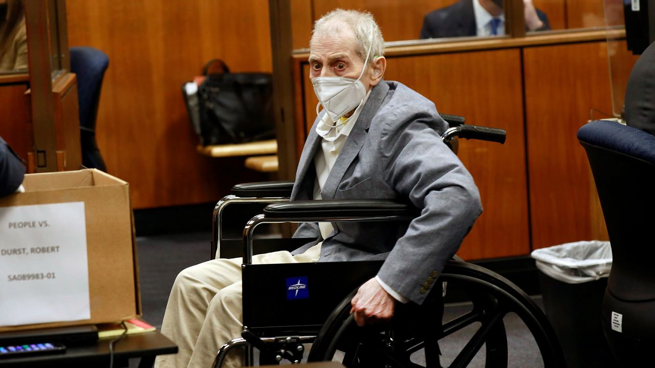 Robert Durst spins his wheelchair in place as he looks at people in the courtroom in Inglewood, Calif. on Sept. 8, 2021. Durst is charged with killing longtime friend Susan Berman in Benedict Canyon just before Christmas Eve 2000. (Al Seib/Los Angeles Times via AP)