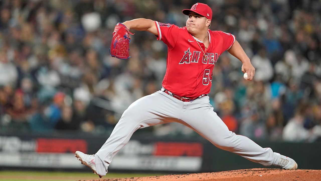 Shohei Ohtani strikes out 10, but A's beat Angels 3-2 in 10 to stay in wild  card race