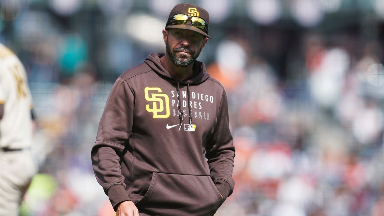 San Diego Padres manager Jayce Tingler walks to the dugout after making a pitching change during the sixth inning of the team's baseball game against the San Francisco Giants in San Francisco on Sept. 16, 2021. (AP Photo/Jeff Chiu)