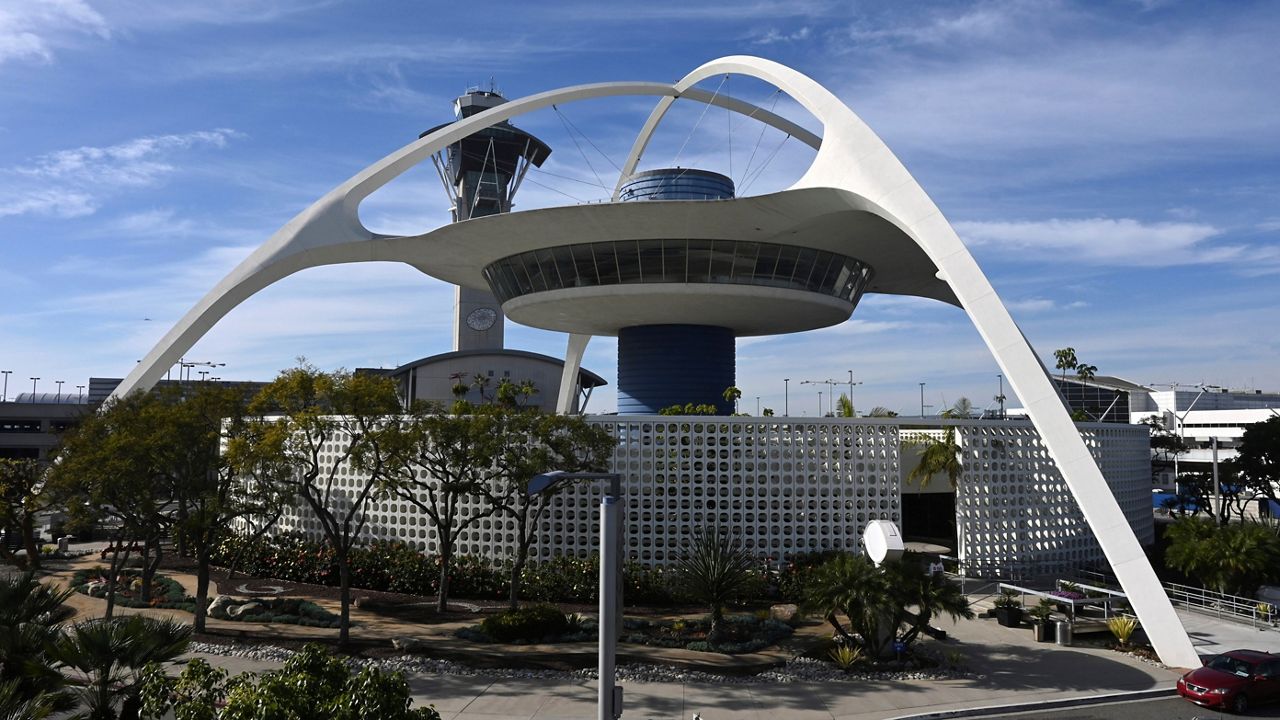 This Jan. 5, 2020, file photo shows the general overall view of the Theme Building and air traffic control tower at Los Angeles International Airport in Los Angeles. (Kirby Lee via AP)
