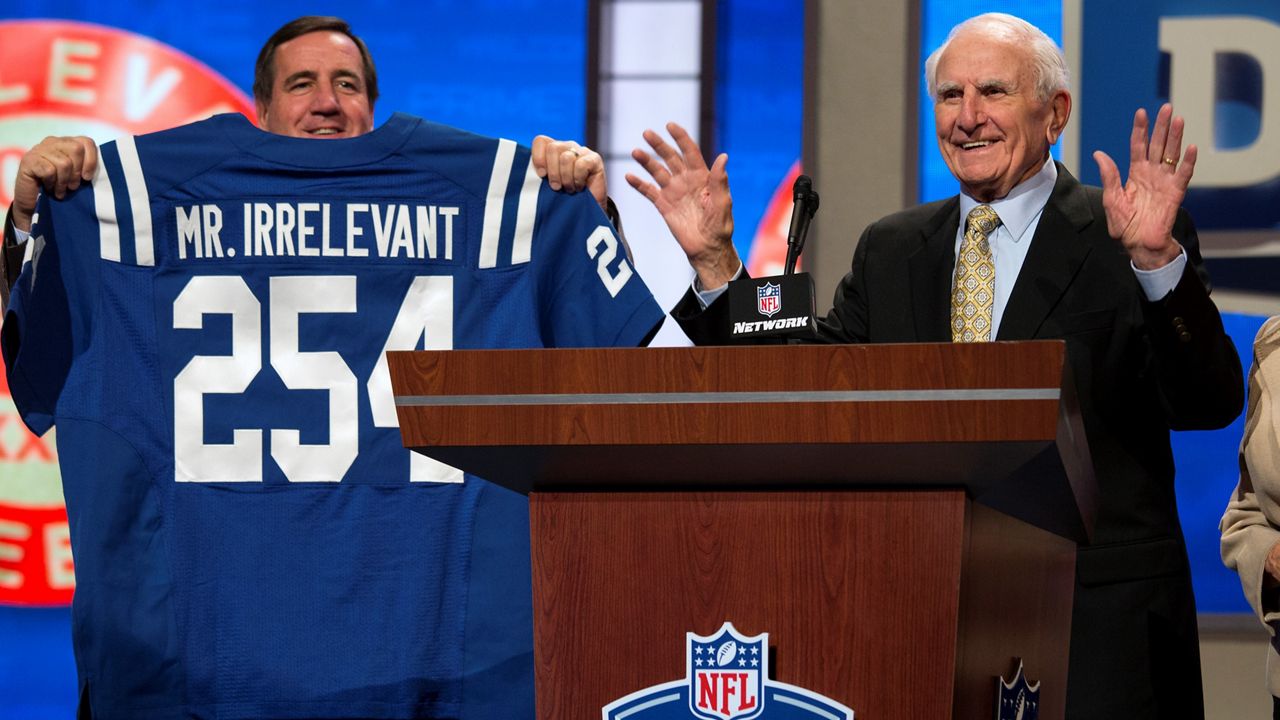 In this April 27, 2013, file photo, former NFL football receiver Paul Salata, right, announces the 254th overall pick of the NFL Draft at Radio City Music Hall in New York. (AP Photo/Craig Ruttle)