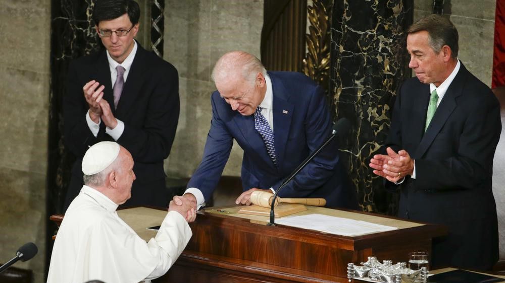 In this Sept. 24, 2015, file photo, then-Vice President Joe Biden shakes hands with Pope Francis on Capitol Hill in Washington. (AP Photo/Pablo Martinez Monsivais)