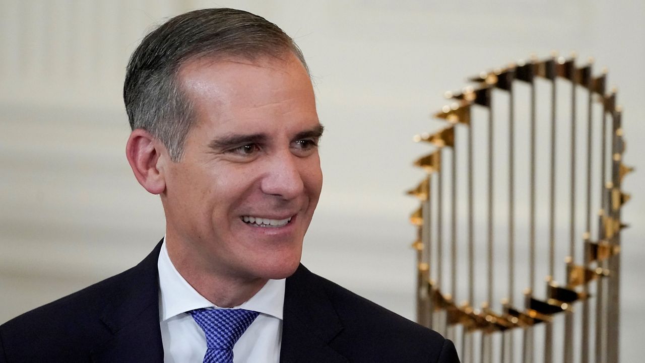 In this July 21, 2021, file photo, Los Angeles Mayor Eric Garcetti arrives for an event to honor the 2020 World Series champion Los Angeles Dodgers baseball team at the White House in Washington. (AP Photo/Julio Cortez)