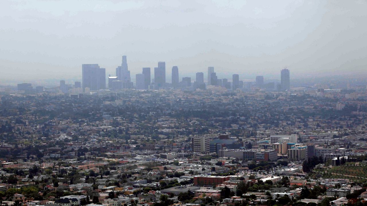 In this April 28, 2009, file photo, smog covers downtown Los Angeles. (AP Photo/Nick Ut)