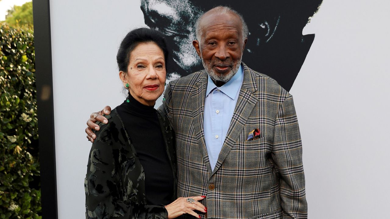 In this June 3, 2019, file photo, Jacqueline Avant and Clarence Avant attend the world premiere of "The Black Godfather" at Paramount Studios in Los Angeles. (Photo by Mark Von Holden/Invision/AP)