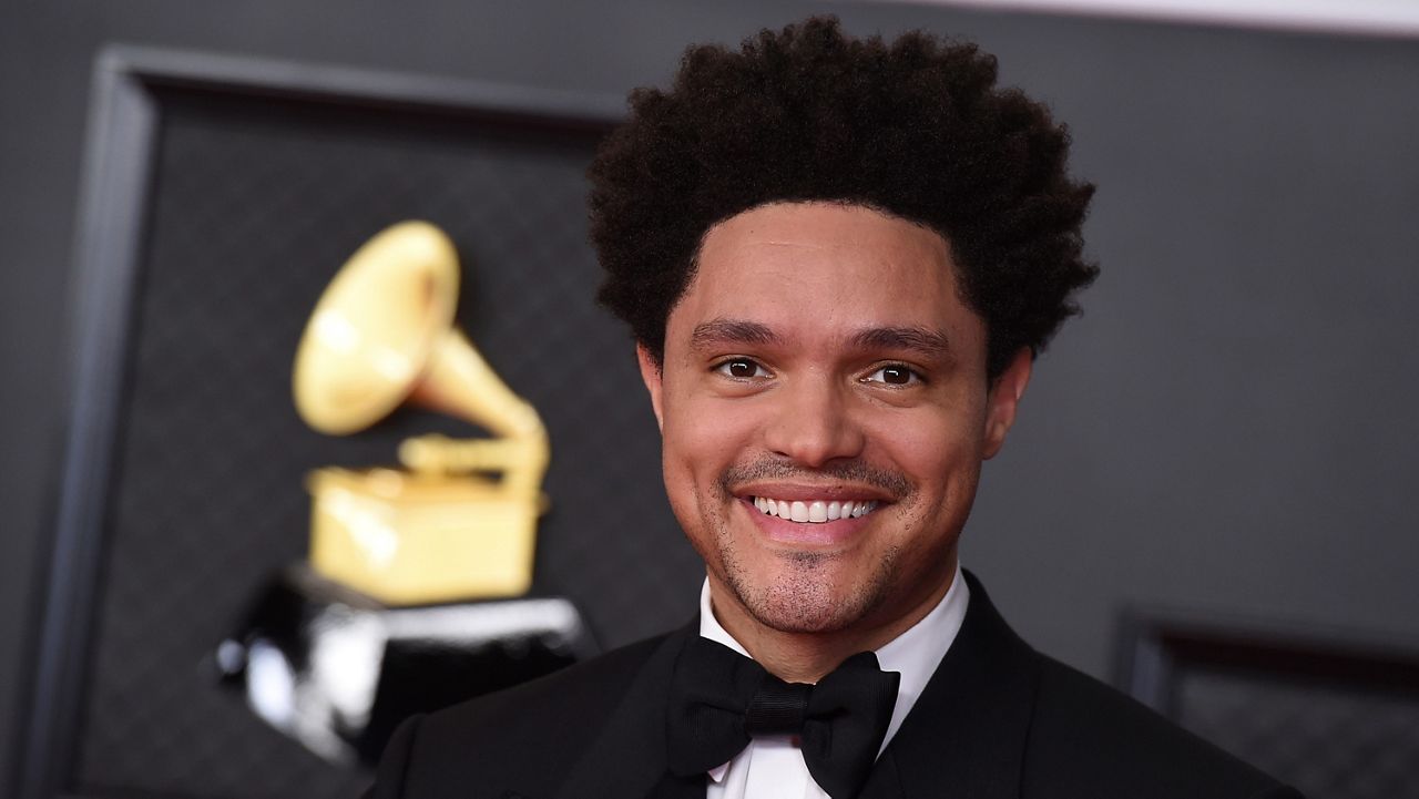 Trevor Noah appears at the 63rd annual Grammy Awards on March 14, 2021, in Los Angeles. Noah is hosting the Grammy Awards for a third-straight year. (Photo by Jordan Strauss/Invision/AP)