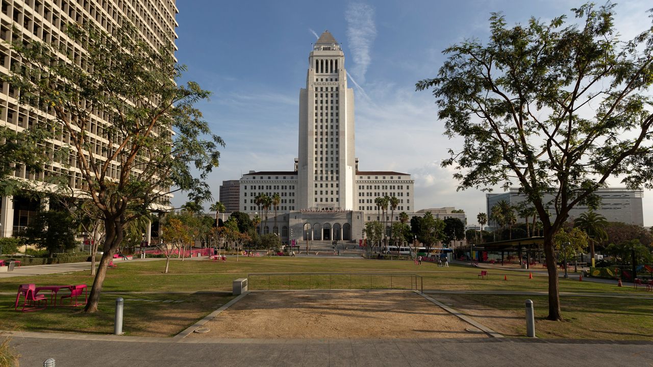 The Los Angeles City Hall building is seen on Jan. 8, 2020, from Grand Park in downtown Los Angeles. (AP Photo/Damian Dovarganes)