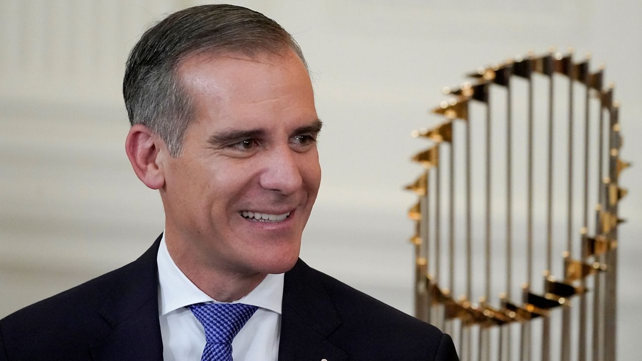In this July 2, 2021, file photo, Los Angeles Mayor Eric Garcetti arrives for an event to honor the 2020 World Series champion Los Angeles Dodgers baseball team at the White House in Washington. (AP Photo/Julio Cortez)