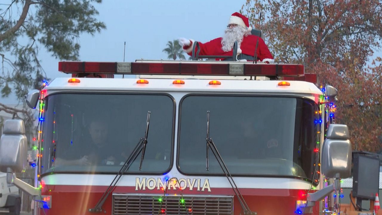 Santa returns for tour of Monrovia atop a fire truck