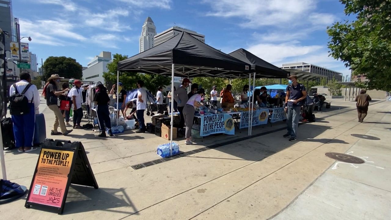 Street charging stations helping those who are homeless
