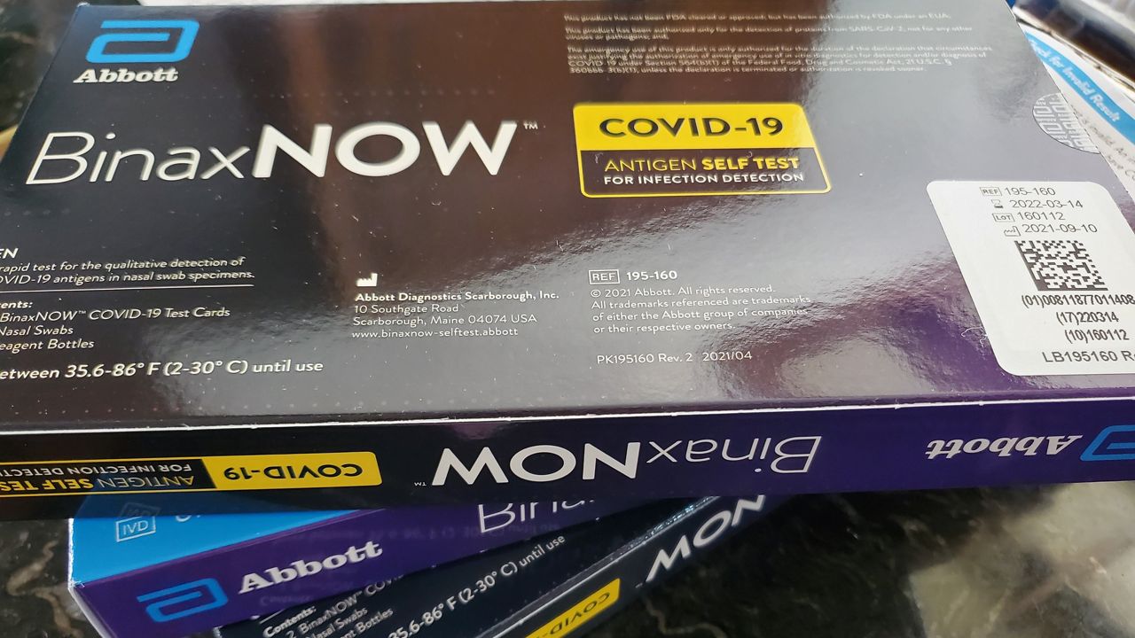 Pictured here is a pack of at-home COVID-19 tests. (Spectrum News/Joseph Pimentel)