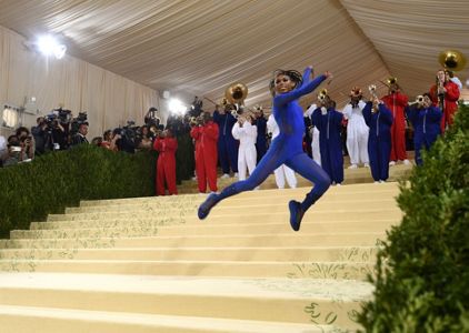 Cordae Dunston, left, and Naomi Osaka attend The Metropolitan