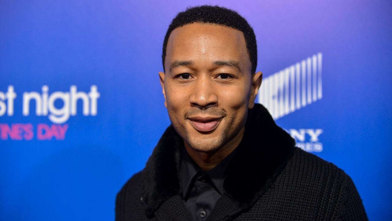 In this Feb. 11, 2014, file photo, John Legend arrives at the Pan African Film and Arts Festival premiere of "About Last Night" in Los Angeles. (Photo by Richard Shotwell/Invision/AP)