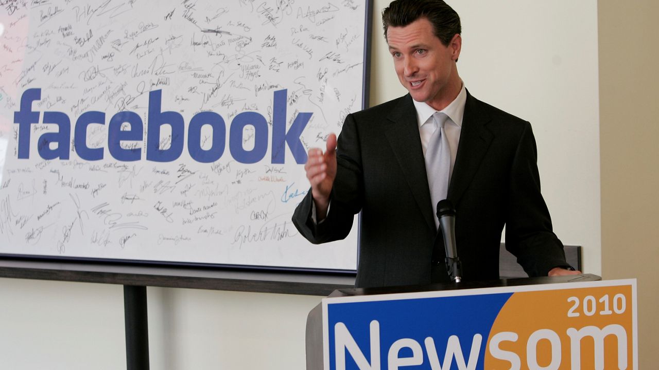 In this April 21, 2009, file photo, then San Francisco Mayor Gavin Newsom formally announces his candidacy for California governor at Facebook headquarters in Palo Alto, Calif. (AP Photo/Paul Sakuma)