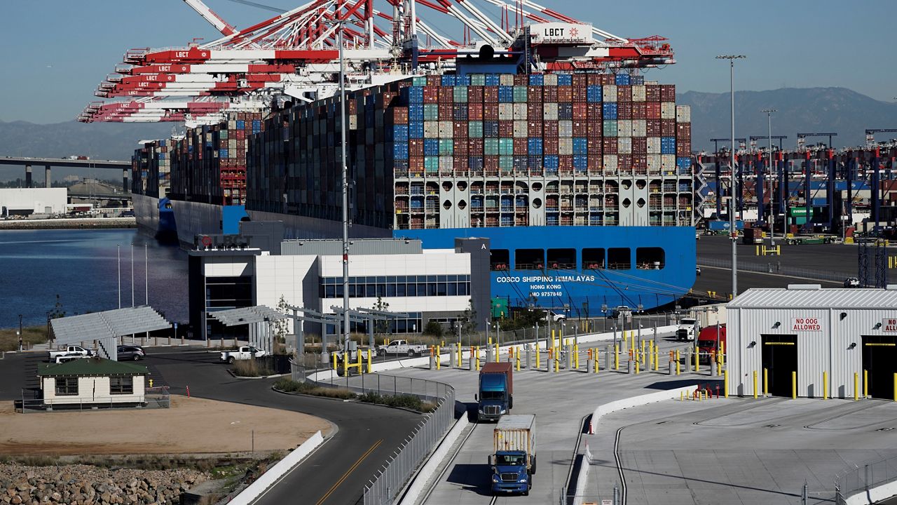 Container ships are docked on Jan. 11, 2022, at the Port of Long Beach in Long Beach, Calif. (AP Photo/Jae C. Hong)