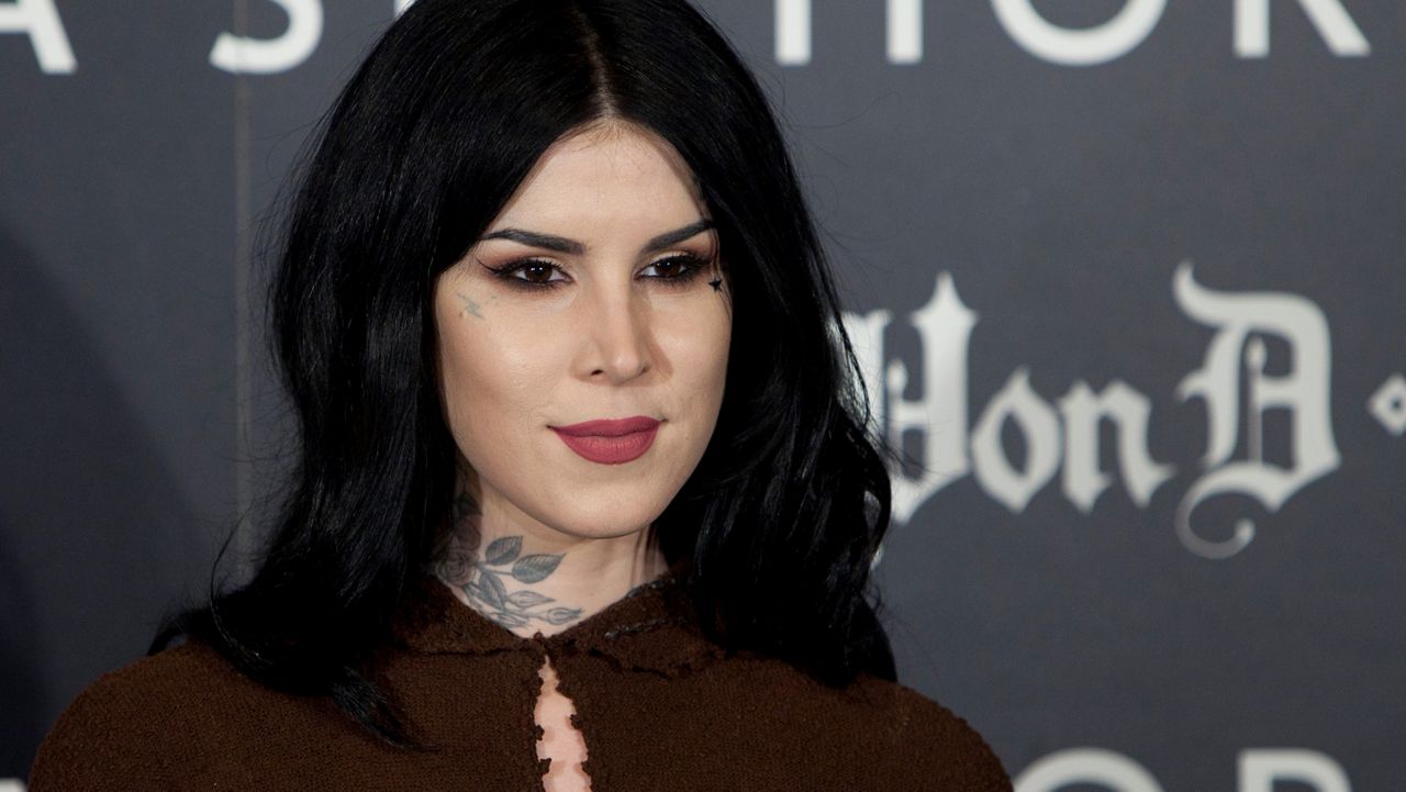 In this Oct. 7, 2015, file photo, U.S. tattoo artist Kat Von D poses for photographers during the presentation of her new line of makeup in Madrid, Spain. (AP Photo/Abraham Caro Marin)