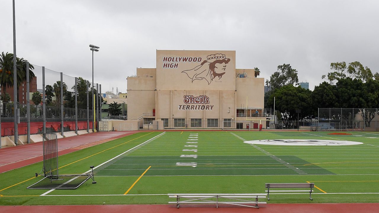 This March 13, 2020, file photo shows the athletic field at Hollywood High School in the Hollywood section of Los Angeles. (AP Photo/Mark J. Terrill)