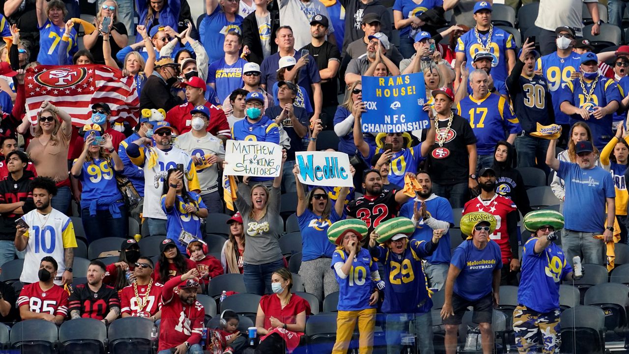 Fans cheer before the NFC Championship NFL football game Sunday between the Los Angeles Rams and the San Francisco 49ers in Inglewood, Calif. (AP Photo/Elaine Thompson)