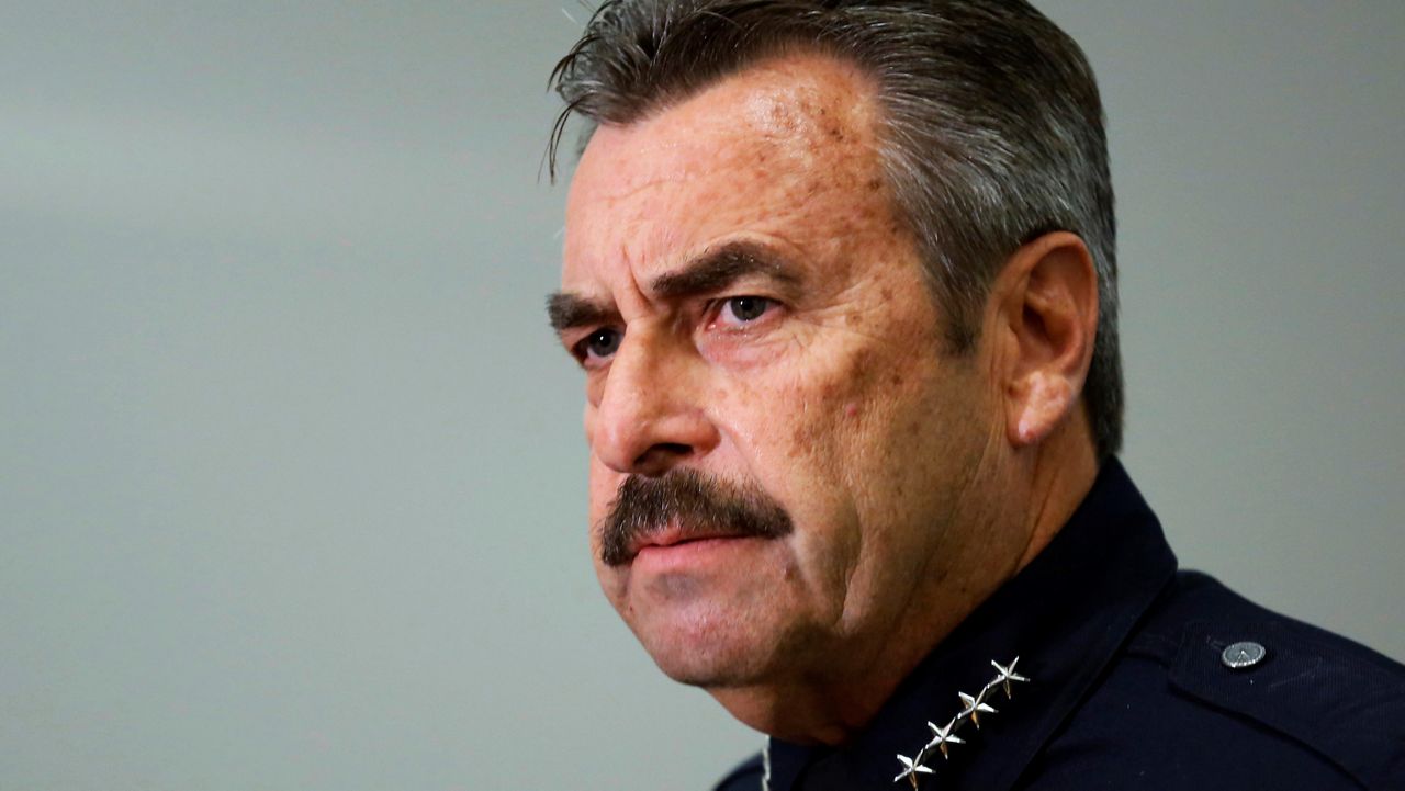 In this Feb. 4, 2014, file photo, Los Angeles Police Chief Charlie Beck speaks at a news conference at LAPD headquarters. (AP Photo/Reed Saxon)