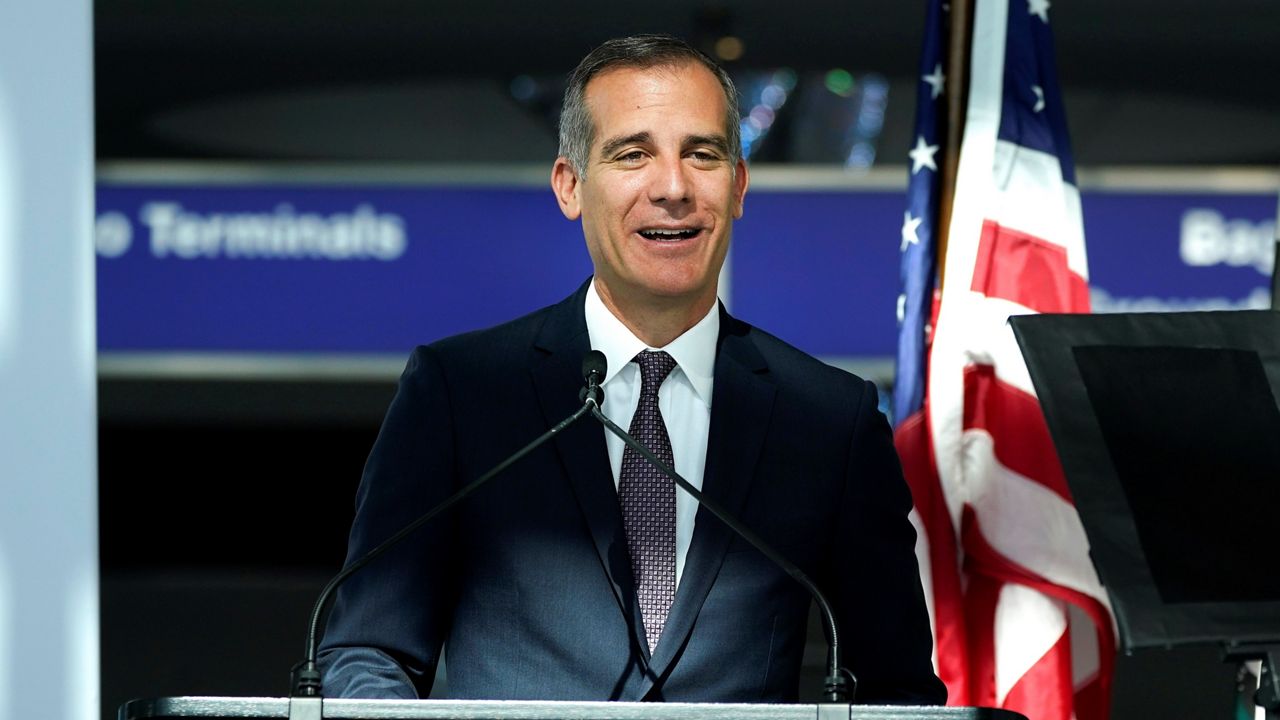 In this May 24, 2021, file photo, Los Angeles Mayor Eric Garcetti speaks at a news conference at Los Angeles International Airport in Los Angeles. (AP Photo/Ashley Landis)