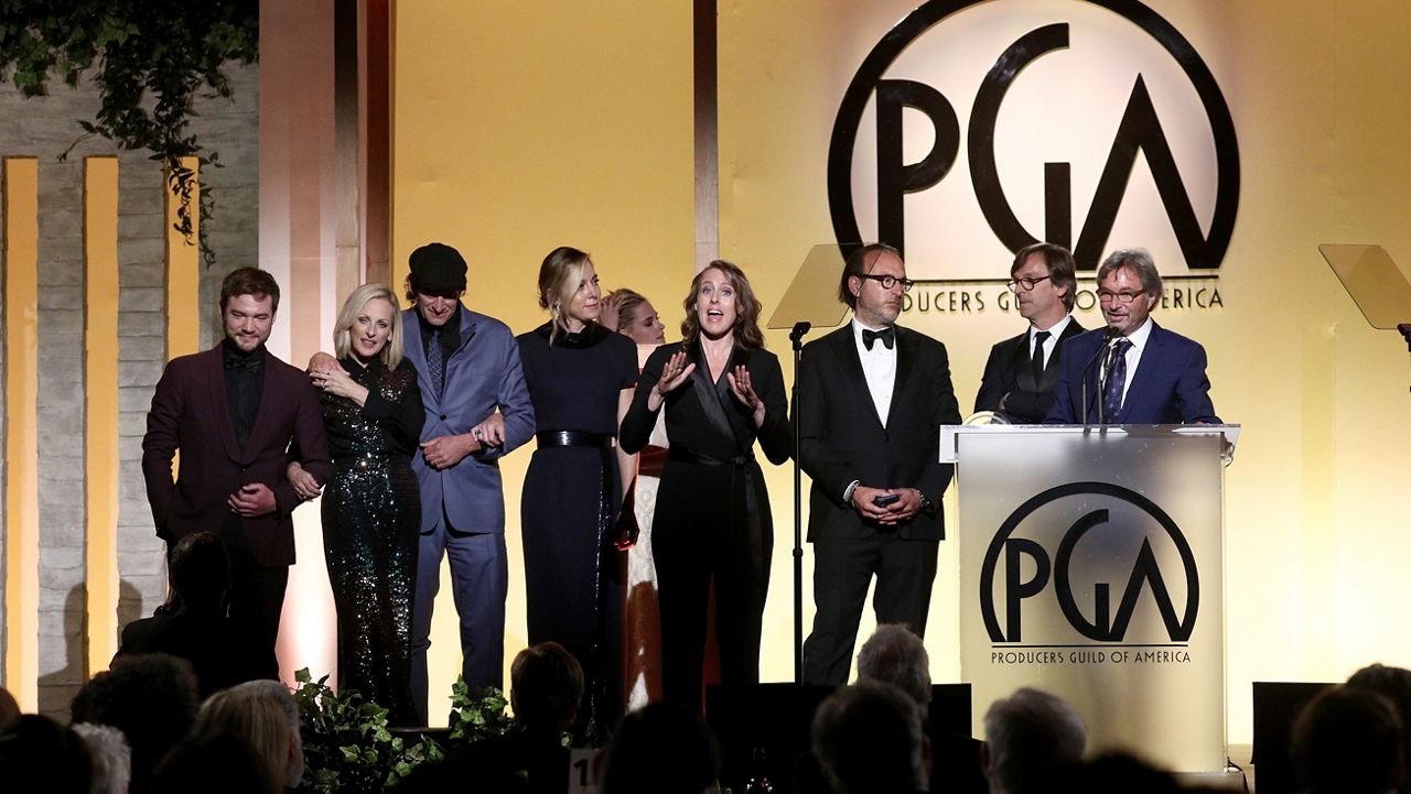 In this Jan. 18, 2020, file photo, Jay Roach accepts the Stanley Kramer Award at the 31st Annual Producers Guild Awards at the Hollywood Palladium in Los Angeles. (Photo by John Salangsang/Invision for the Producers Guild of America/AP Images)