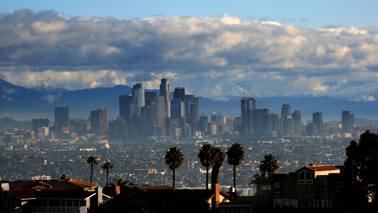 Clouds butted up against the the mountains around Downtown Los Angeles