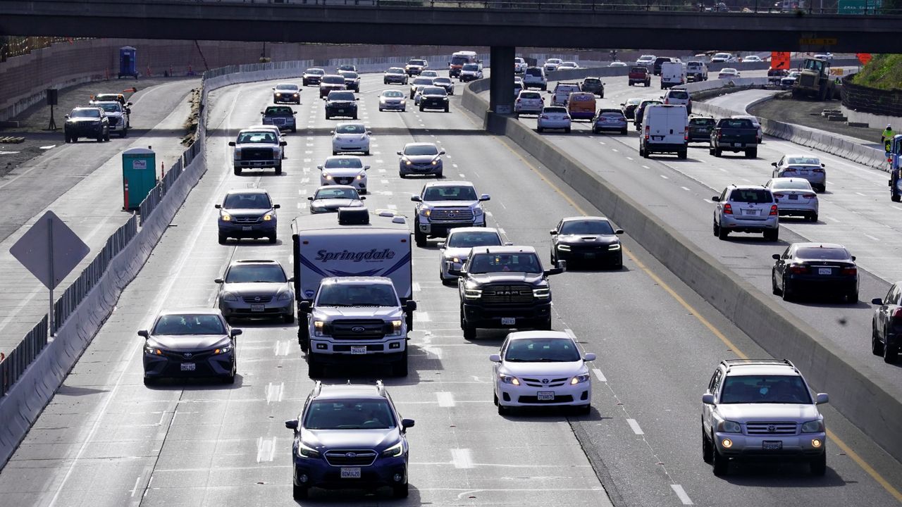 Traffic flows on westbound U.S. 50 on April 13, 2022, in Sacramento, Calif. (AP Photo/Rich Pedroncelli)