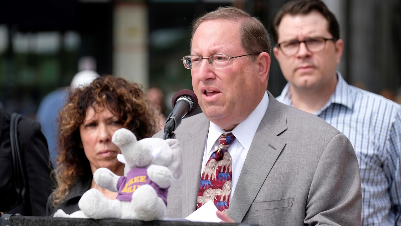 In this April 18, 2017, file photo, Los Angeles City Councilman Paul Koretz, flanked by activists from several animal-welfare advocacy groups talks during a news conference at the Los Angeles Zoo. (AP Photo/Richard Vogel)