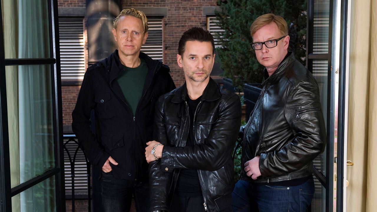 This Feb. 11, 2009, file photo shows Depeche Mode members Martin Gore, left, Dave Gahan and Andrew Fletcher, right, in New York. (AP Photo/Charles Sykes)