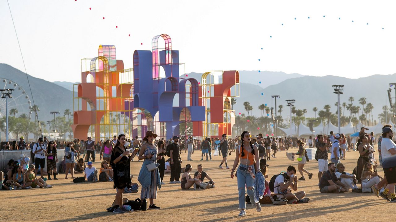 Festivalgoers are seen at the Coachella Music & Arts Festival at the Empire Polo Club on April 24, 2022, in Indio, Calif. (Photo by Amy Harris/Invision/AP)