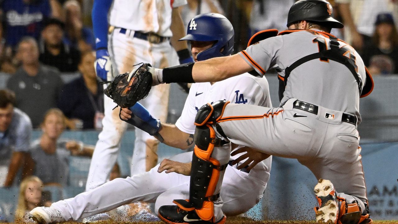 Los Angeles Dodgers’ Freddie Freeman hits a two-run home run against the San Francisco Giants during the first inning of a baseball game Monday in Los Angeles. (AP Photo/John McCoy)