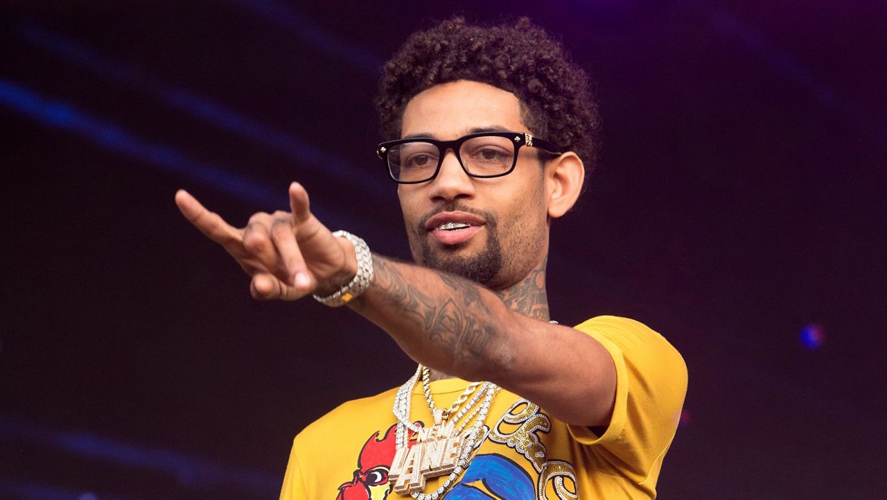 Philadelphia rapper PnB Rock performs at the 2018 Firefly Music Festival in Dover, Del., on June 16, 2018. (Photo by Owen Sweeney/Invision/AP)