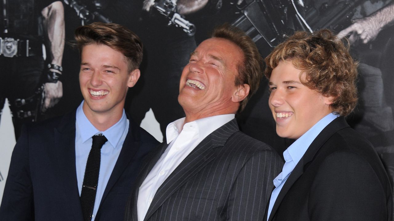 Patrick Schwarzenegger, Arnold Schwarzenegger and Christopher Schwarzenegger attend the premiere for “The Expendables 2” on Aug. 15, 2012, at Grauman’s Chinese Theatre in Los Angeles. (Photo by Jordan Strauss/Invision/AP)