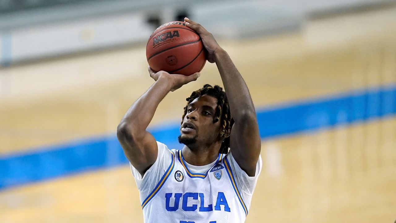 UCLA forward Jalen Hill takes a shot during the second half of an NCAA college basketball game on Jan. 16, 2021, against Washington in Los Angeles. (AP Photo/Ashley Landis)