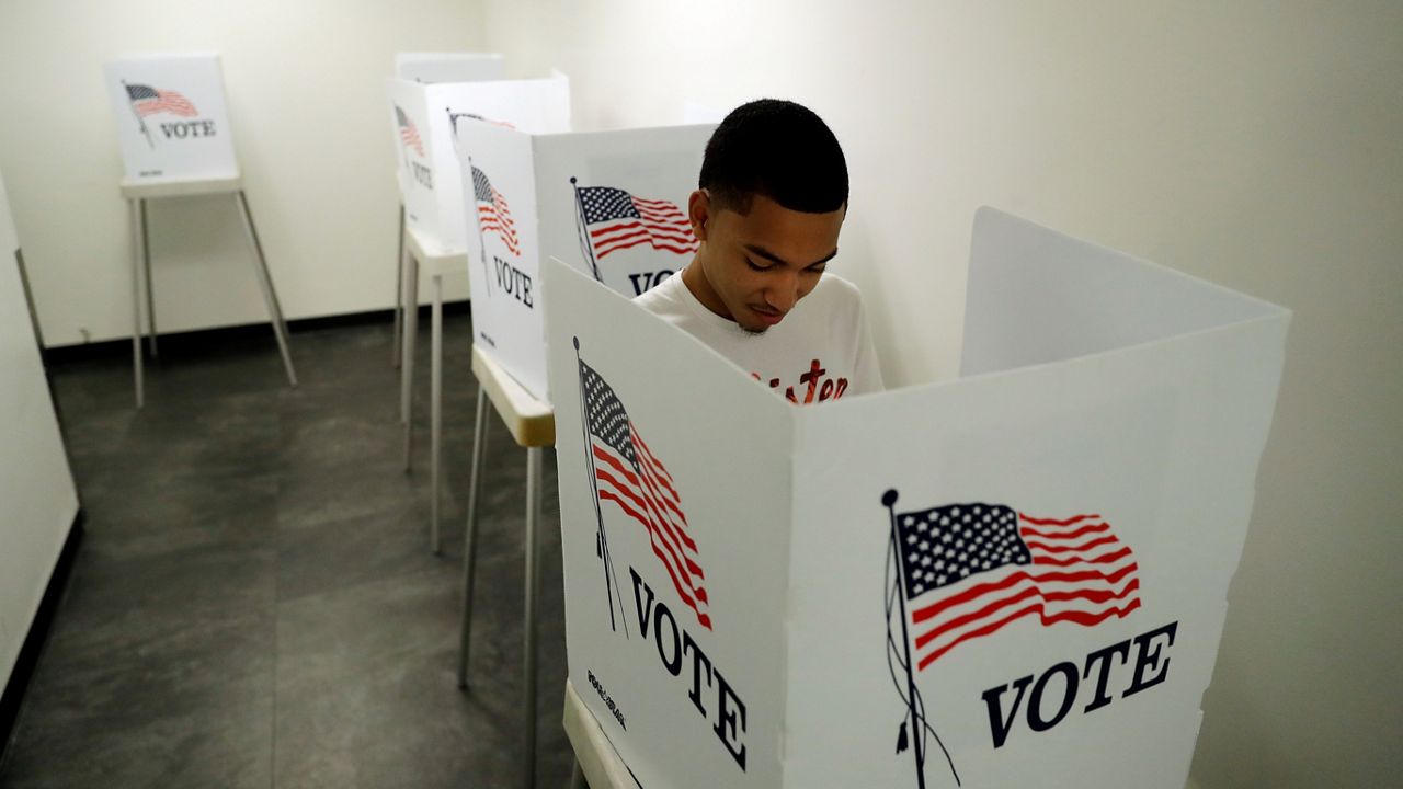 voter in a voting booth