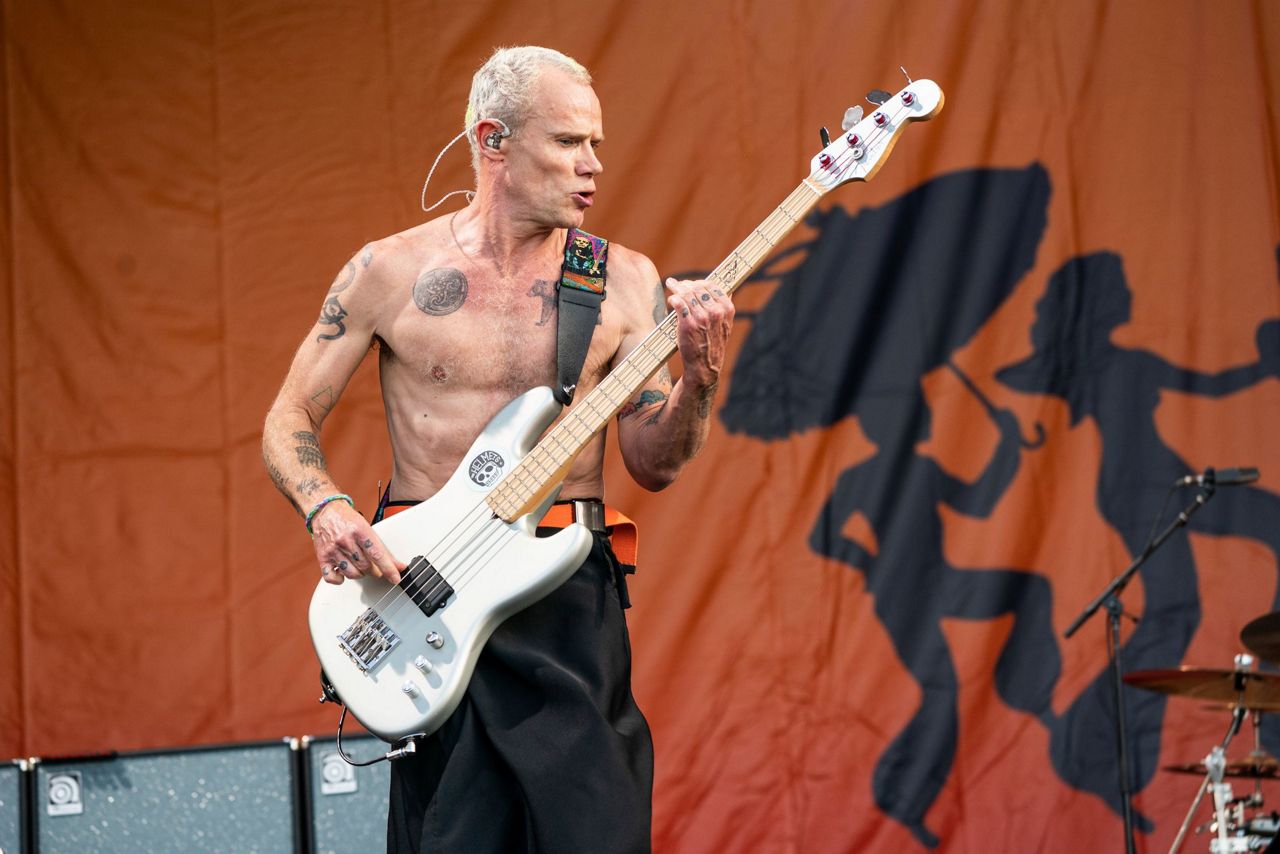 Chili Peppers honor Foo Fighter's drummer at Jazz Fest
