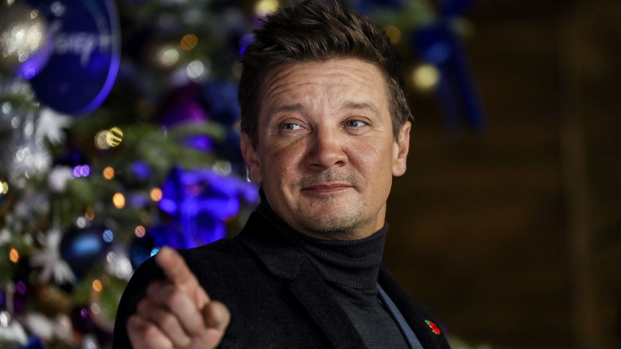 Jeremy Renner poses for photographers upon arrival at the UK Fan Screening of the film “Hawkeye” on Nov. 11, 2021, in London. (Photo by Vianney Le Caer/Invision/AP)