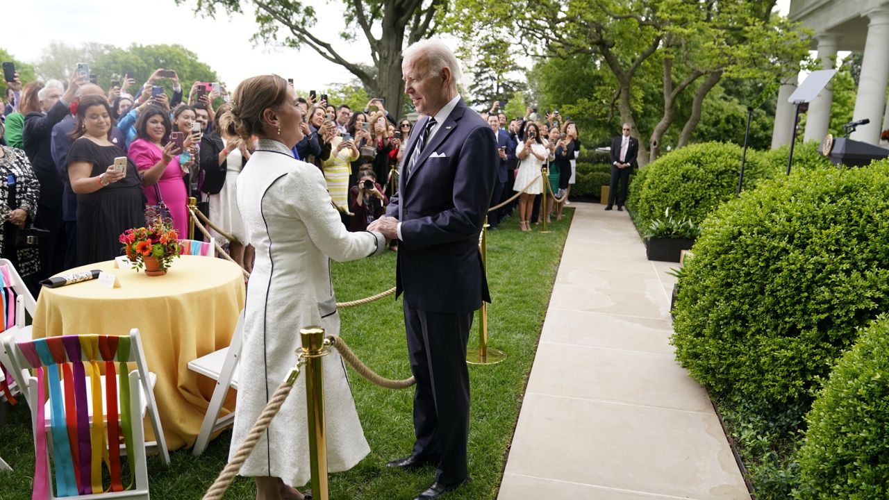 President Joe Biden greets Mexico's first lady Beatriz Gutierrez Muller during a Cinco de Mayo event in the Rose Garden of the White House, Thursday, May 5, 2022, in Washington. (AP Photo/Evan Vucci)