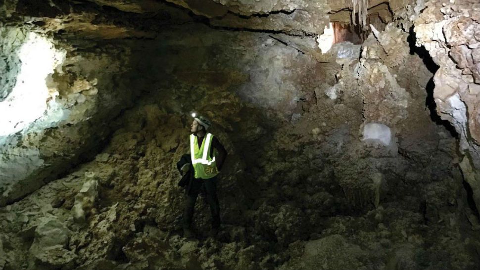 A crew member surveys a cave that was discovered in Williamson County in 2018. (Williamson County)