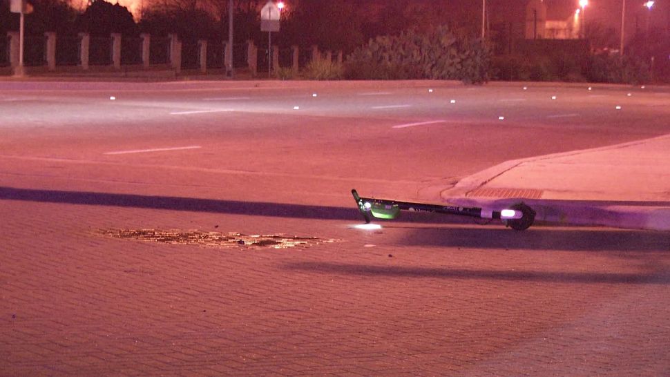 A Lime scooter on the roadway in the area of East Carson and North Walters Street in San Antonio following an incident that left a woman critically injured in this image from December 18, 2018. (Ken Branca)